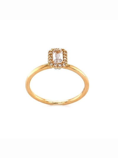 Bague en or avec pierres blanches