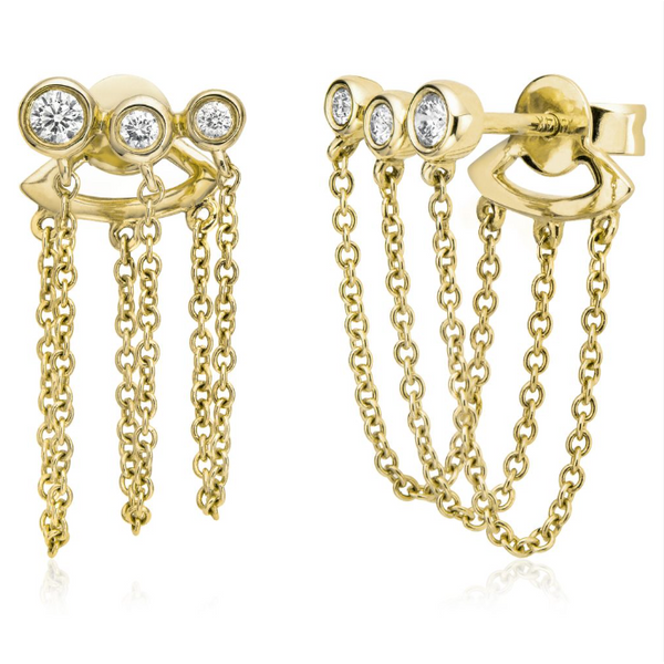 Gold earrings with white topaz